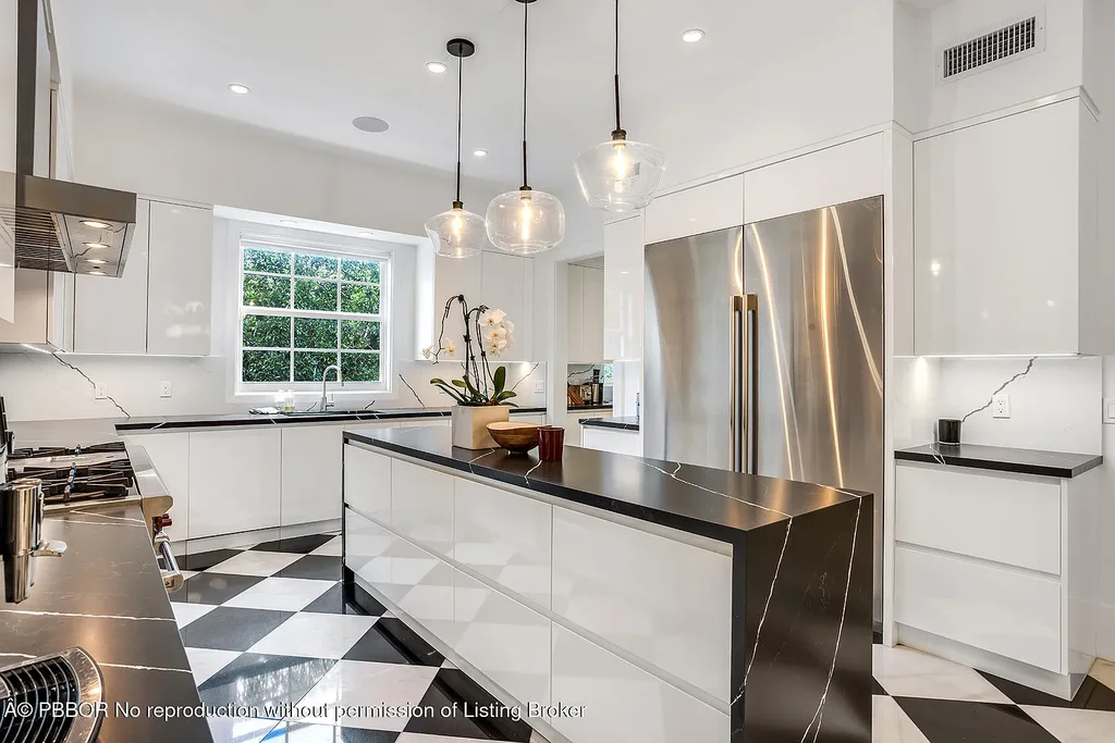 134 Casa Bendita Palm Beach luxury home for sale featuring 4 bedrooms, 5 baths, private pool, sun-drenched great room, and elegant Regency architecture.
