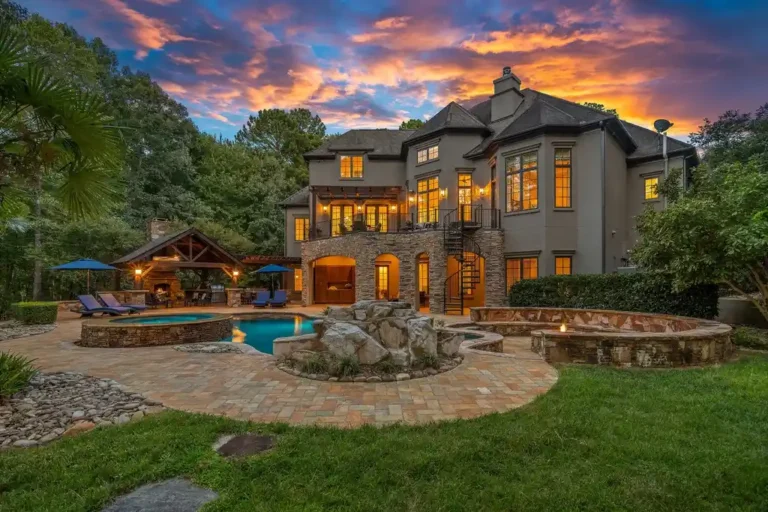 Exclusive $3.75M Waterfront Retreat Showcases Timeless Stucco and Stone in North Carolina