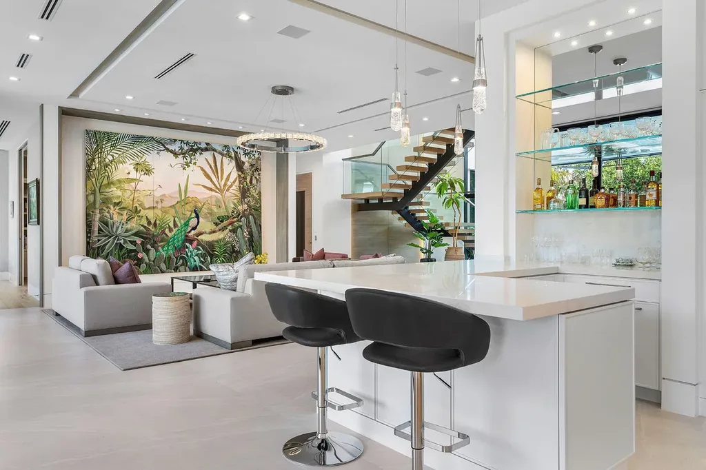175 W Alexander Palm Road luxury waterfront home for sale in Boca Raton with modern design, private dock, resort-style pool, and Royal Palm Yacht Club location.