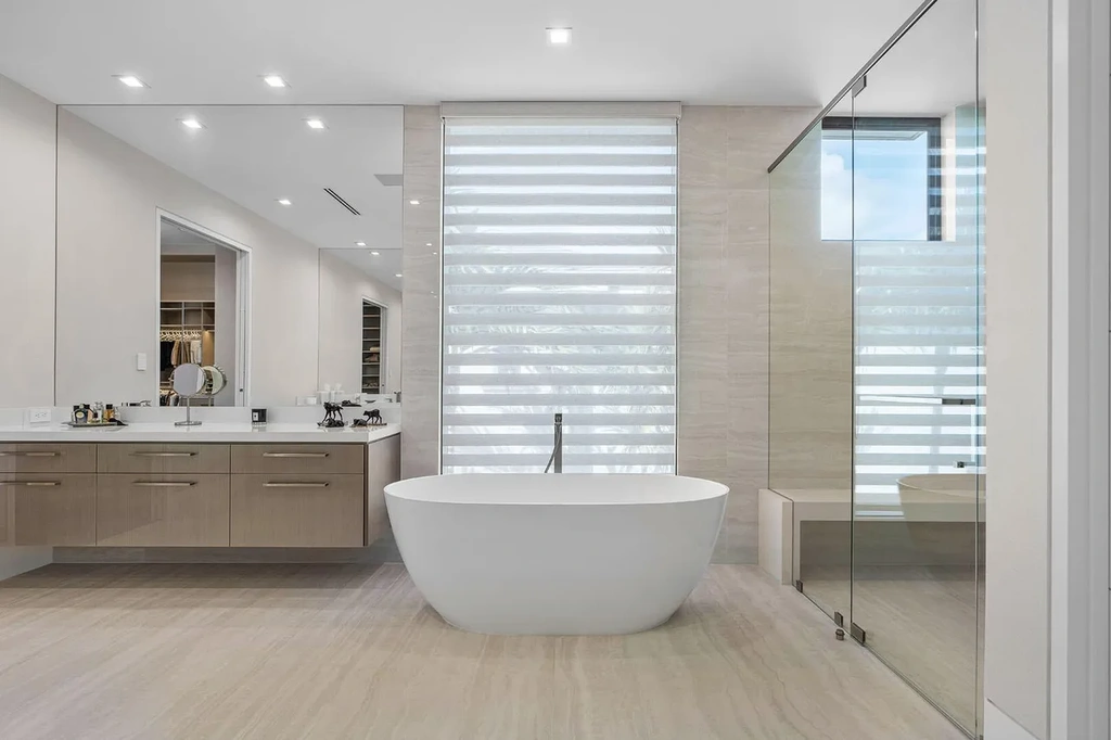 175 W Alexander Palm Road luxury waterfront home for sale in Boca Raton with modern design, private dock, resort-style pool, and Royal Palm Yacht Club location.