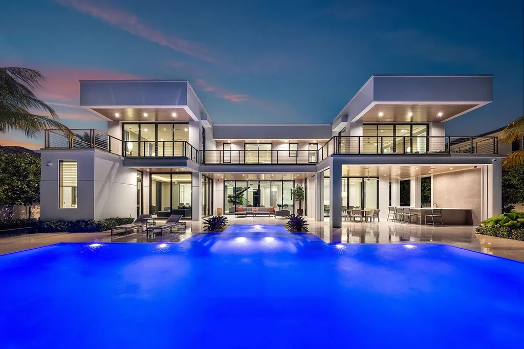 175 W Alexander Palm Road luxury waterfront home for sale in Boca Raton with modern design, private dock, resort-style pool, and Royal Palm Yacht Club location.