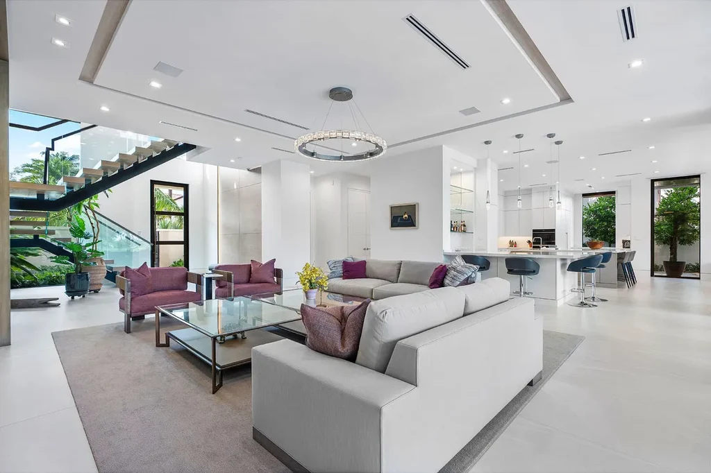 175 W Alexander Palm Road luxury waterfront home for sale in Boca Raton with modern design, private dock, resort-style pool, and Royal Palm Yacht Club location.