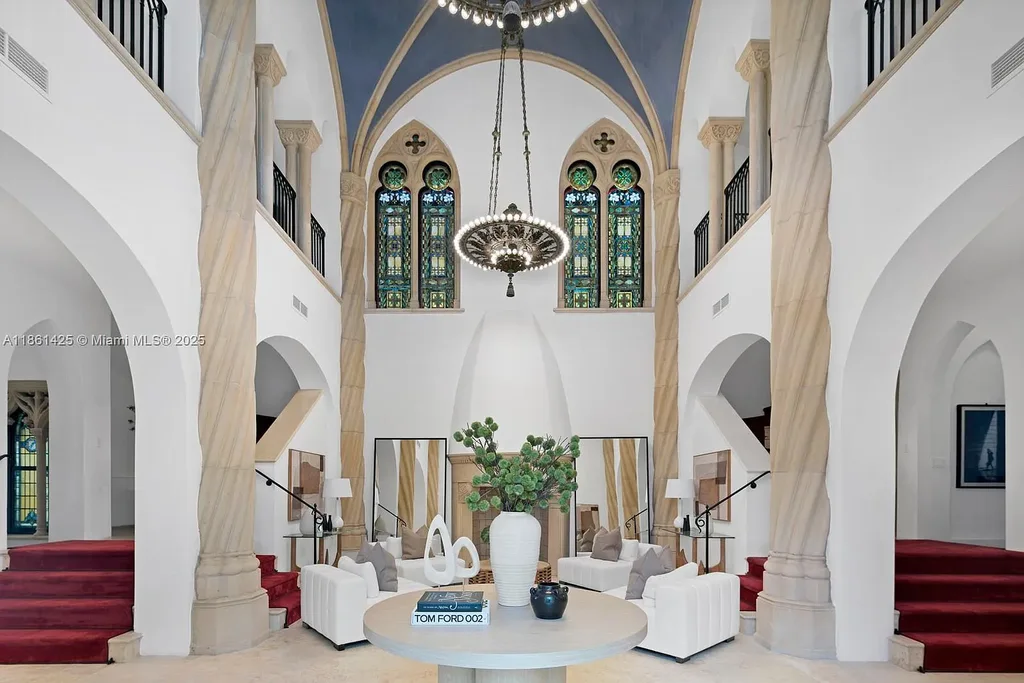 Luxury waterfront estate at 1840 S Bayshore Ln Miami, a $24 million Coconut Grove home for sale with Gothic design, infinity pool, and bay views.