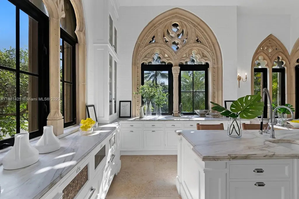 Luxury waterfront estate at 1840 S Bayshore Ln Miami, a $24 million Coconut Grove home for sale with Gothic design, infinity pool, and bay views.