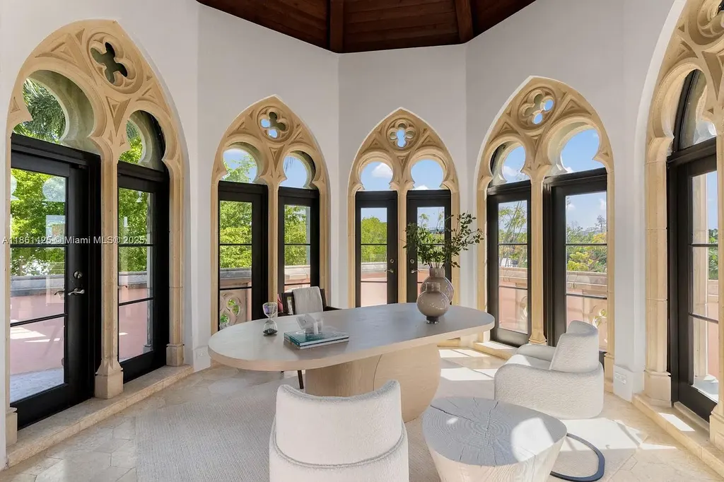 Luxury waterfront estate at 1840 S Bayshore Ln Miami, a $24 million Coconut Grove home for sale with Gothic design, infinity pool, and bay views.