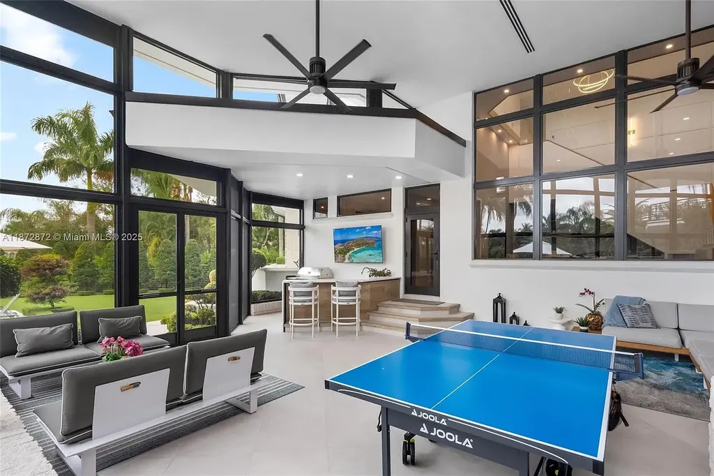 2965 Surrey Ln Weston FL – $11M waterfront luxury home for sale with modern design, spacious interiors, and prime Weston real estate location