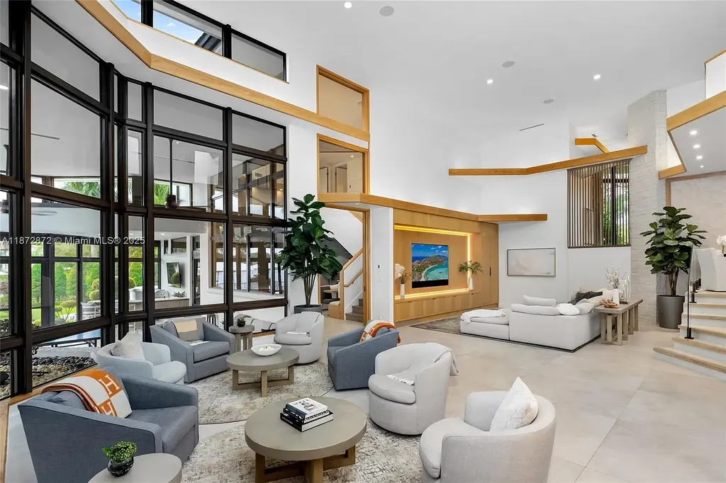 2965 Surrey Ln Weston FL – $11M waterfront luxury home for sale with modern design, spacious interiors, and prime Weston real estate location