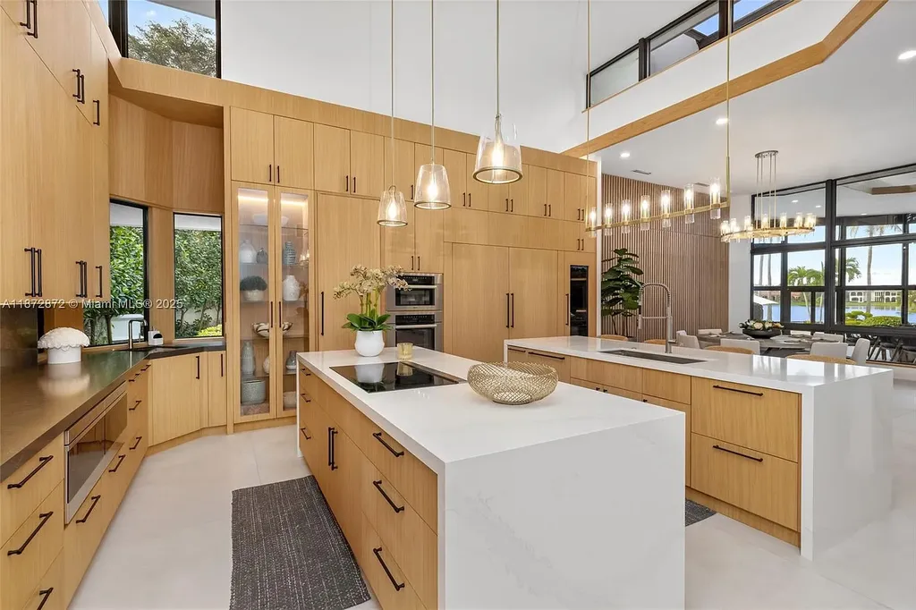 2965 Surrey Ln Weston FL – $11M waterfront luxury home for sale with modern design, spacious interiors, and prime Weston real estate location