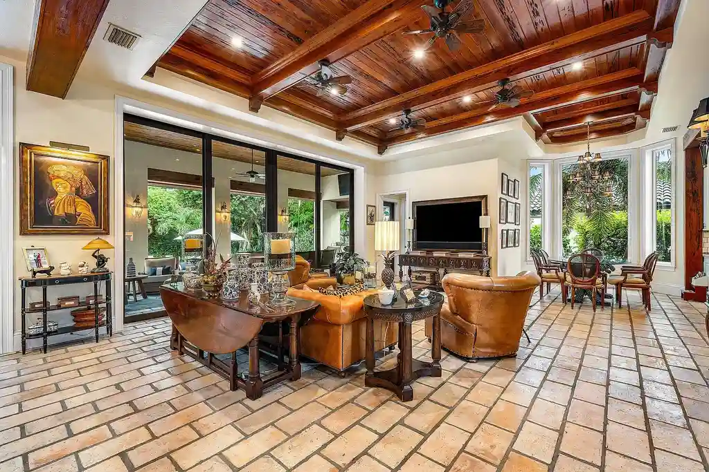 Front exterior of 518 Harbor Court Delray Beach luxury home for sale with European-inspired architecture and lush landscaping