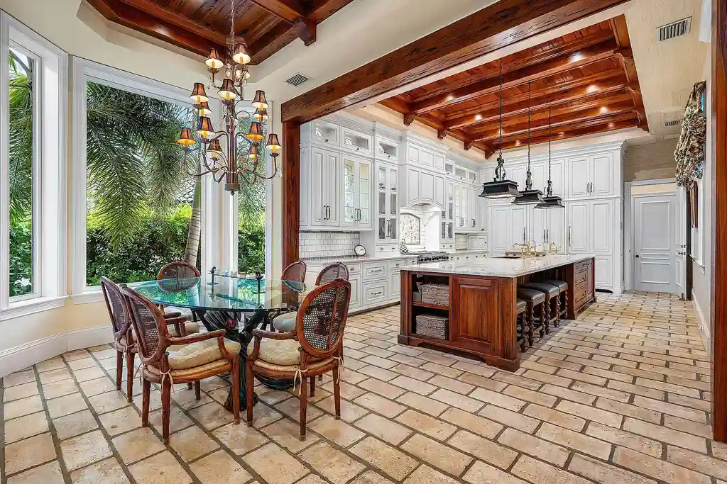 Front exterior of 518 Harbor Court Delray Beach luxury home for sale with European-inspired architecture and lush landscaping