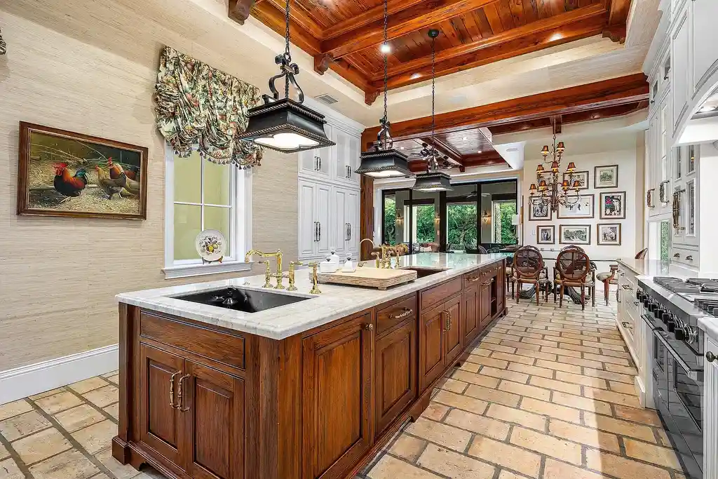 Front exterior of 518 Harbor Court Delray Beach luxury home for sale with European-inspired architecture and lush landscaping