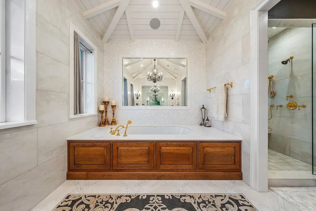 Front exterior of 518 Harbor Court Delray Beach luxury home for sale with European-inspired architecture and lush landscaping
