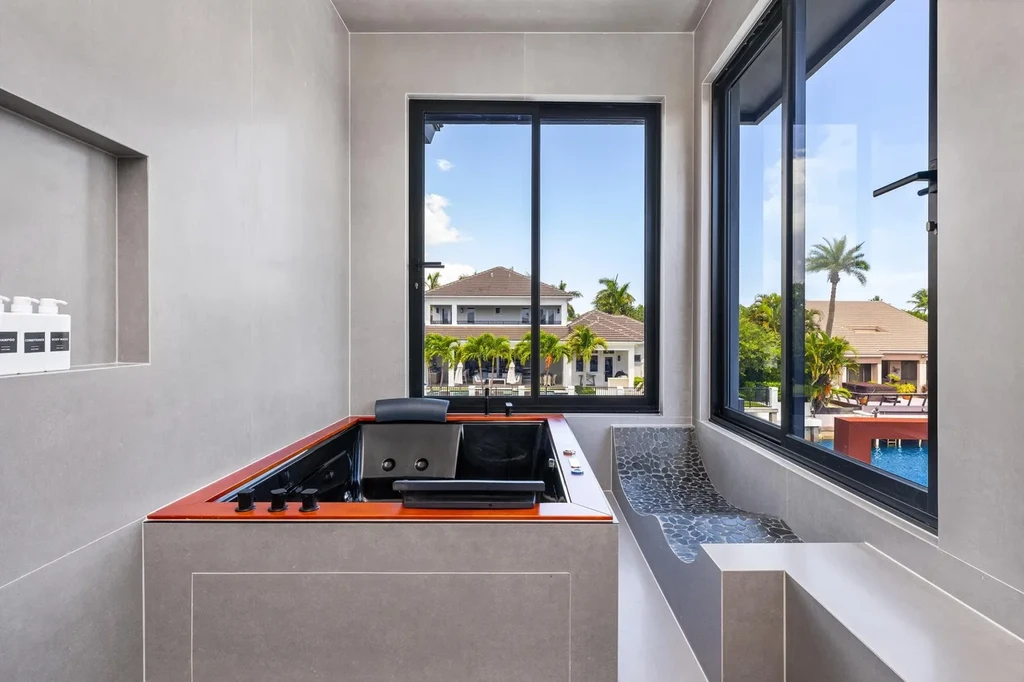 839 NE Bay Isle Drive luxury waterfront home in Boca Raton featuring modern architecture, saltwater pool, and direct ocean access