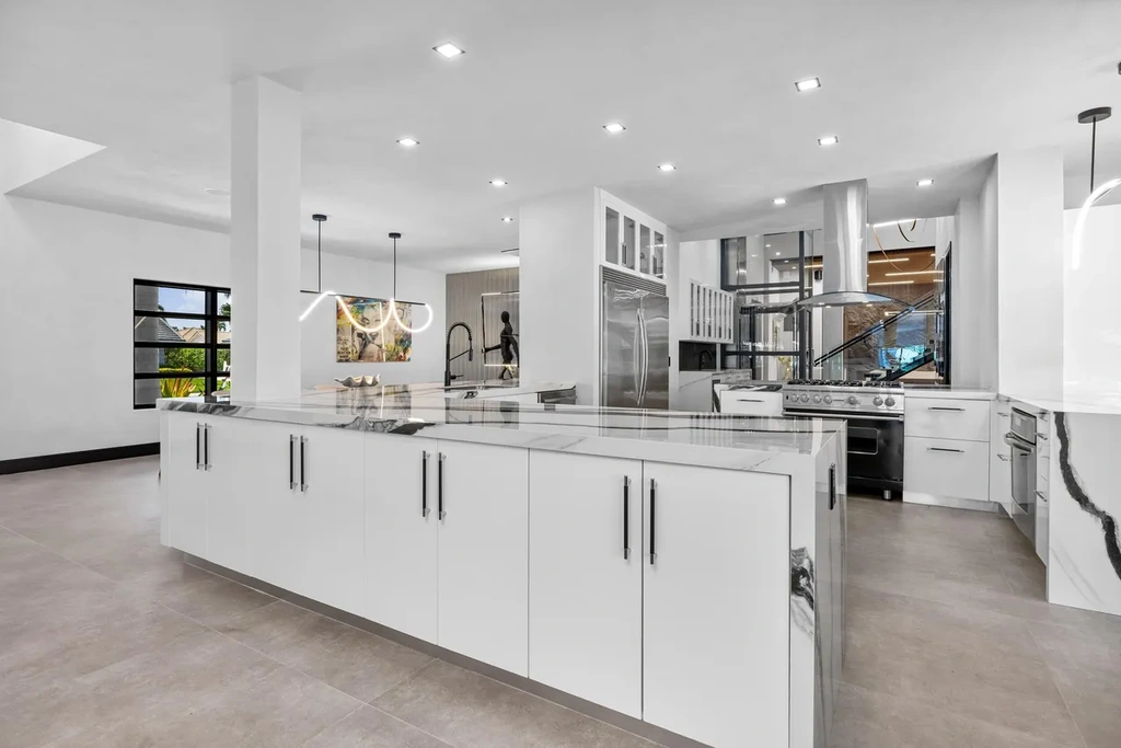 839 NE Bay Isle Drive luxury waterfront home in Boca Raton featuring modern architecture, saltwater pool, and direct ocean access