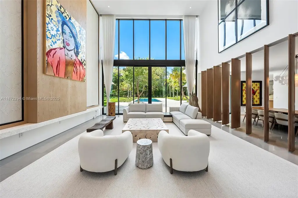 Aerial view of the $31.5M ultra-luxury waterfront mansion at 9440 Old Cutler Lane in Coral Gables, showcasing private dock and lush landscaping