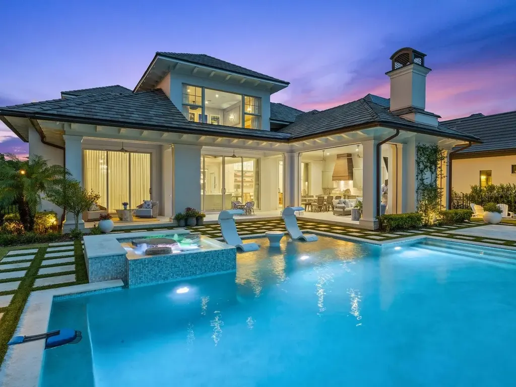 Front exterior of 10463 Los Feliz Dr luxury home in Golden Oak Orlando Real Estate