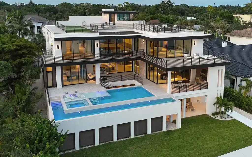 Exterior view of 388 S Shore Dr Sarasota FL waterfront estate with bay views
