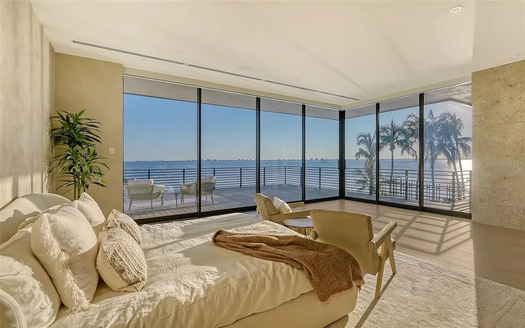 Exterior view of 388 S Shore Dr Sarasota FL waterfront estate with bay views